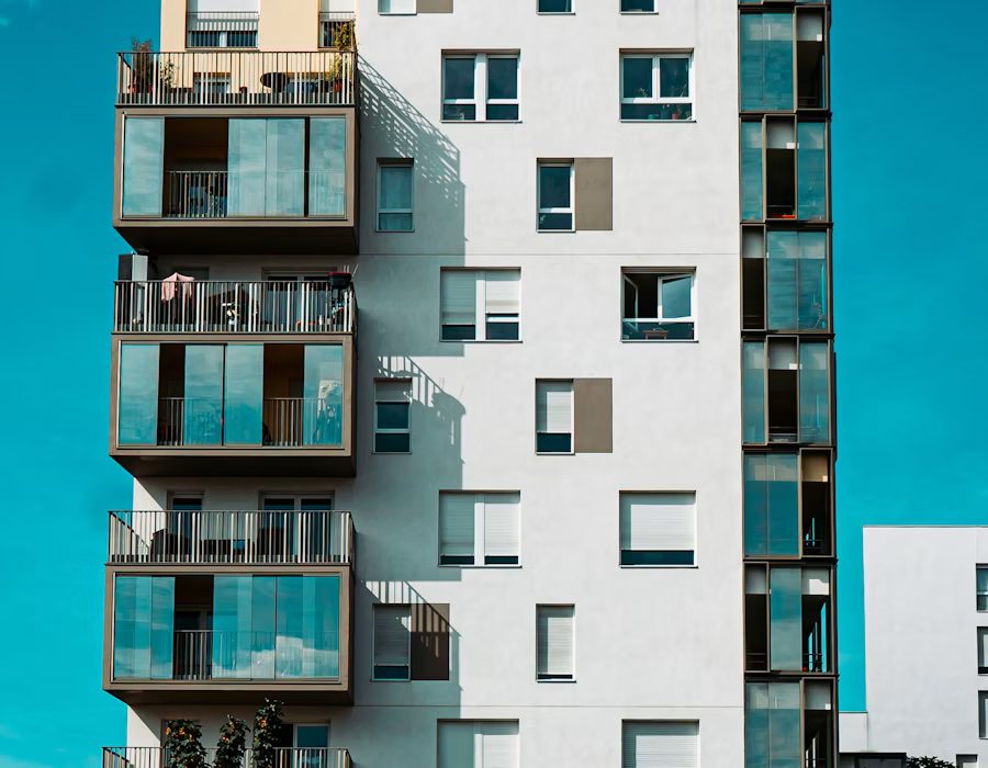 Apartment building against blue sky