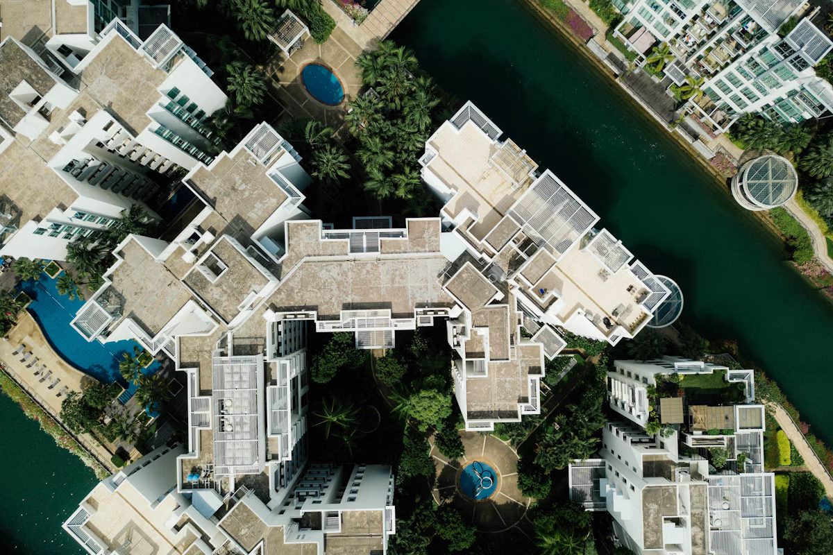 Aerial view of residential buildings by the water